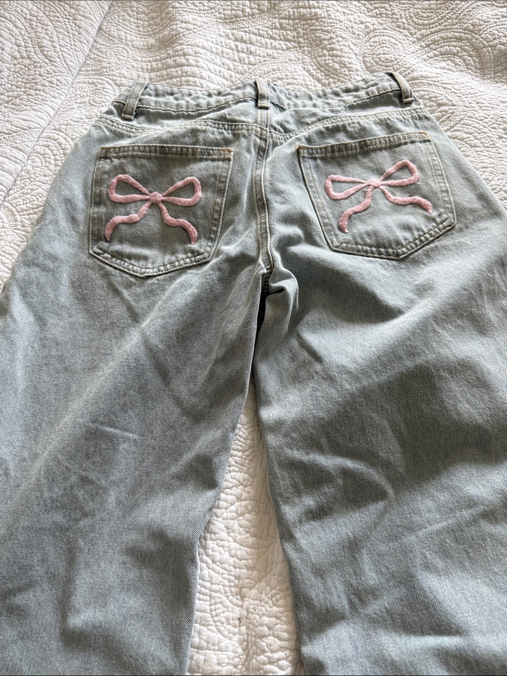 XS Edikted Light Wash Wide Leg Jeans with Pink Bow Pocket Embroidery